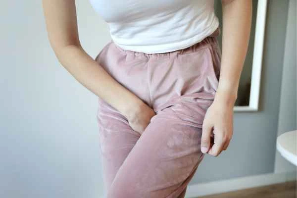 woman running for the toilet because of urinary incontinence Royal Leamington Spa